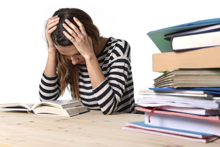 student with textbooks