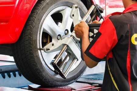 man repairing tire