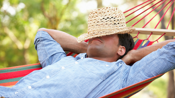man napping in  a hammock