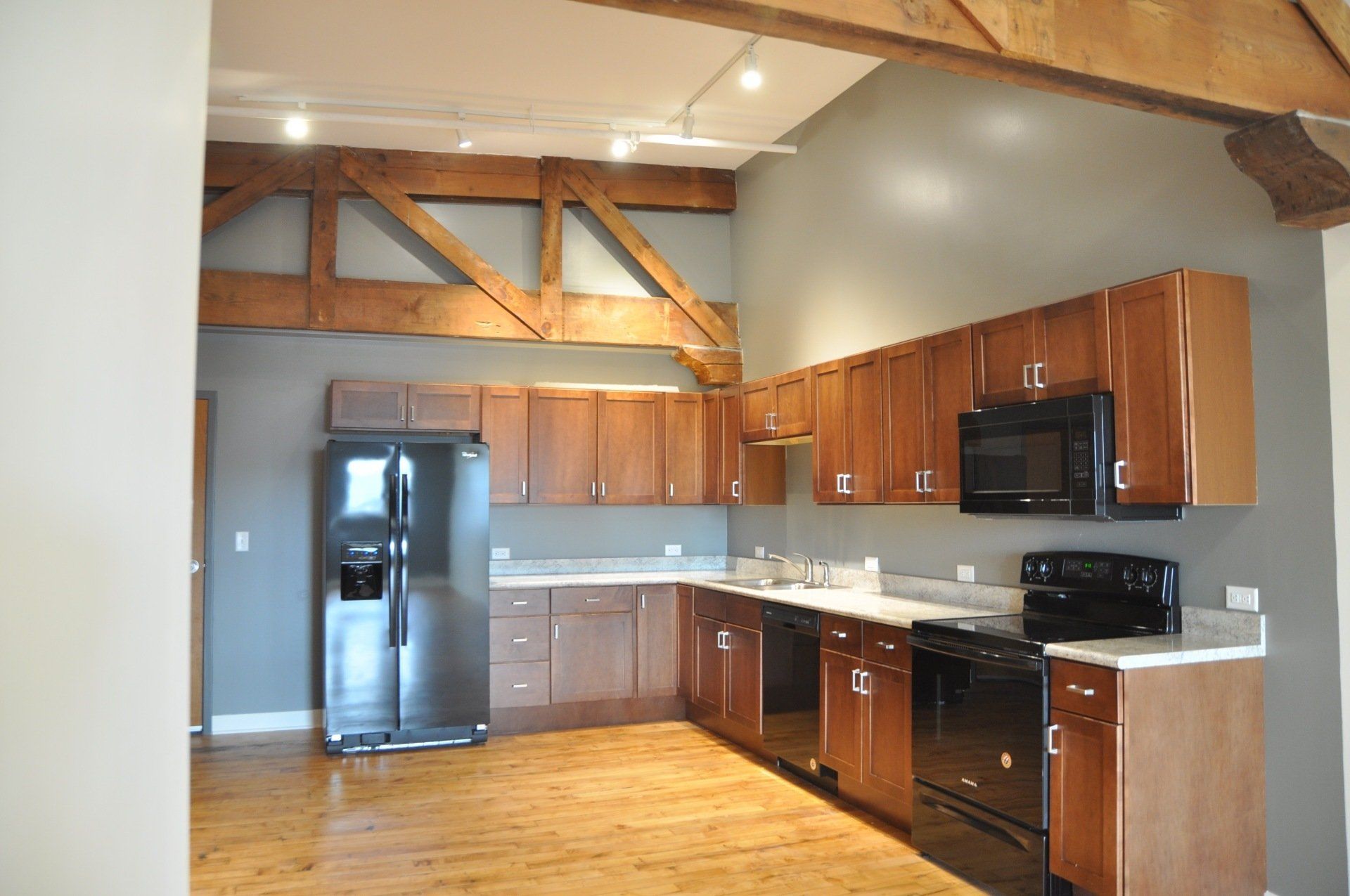 Interior of kitchen with wooden cabinetry