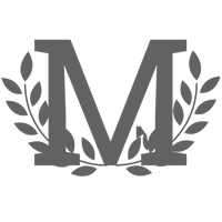 The letter m is surrounded by leaves on a white background.