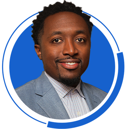 A man in a suit is smiling in a blue circle