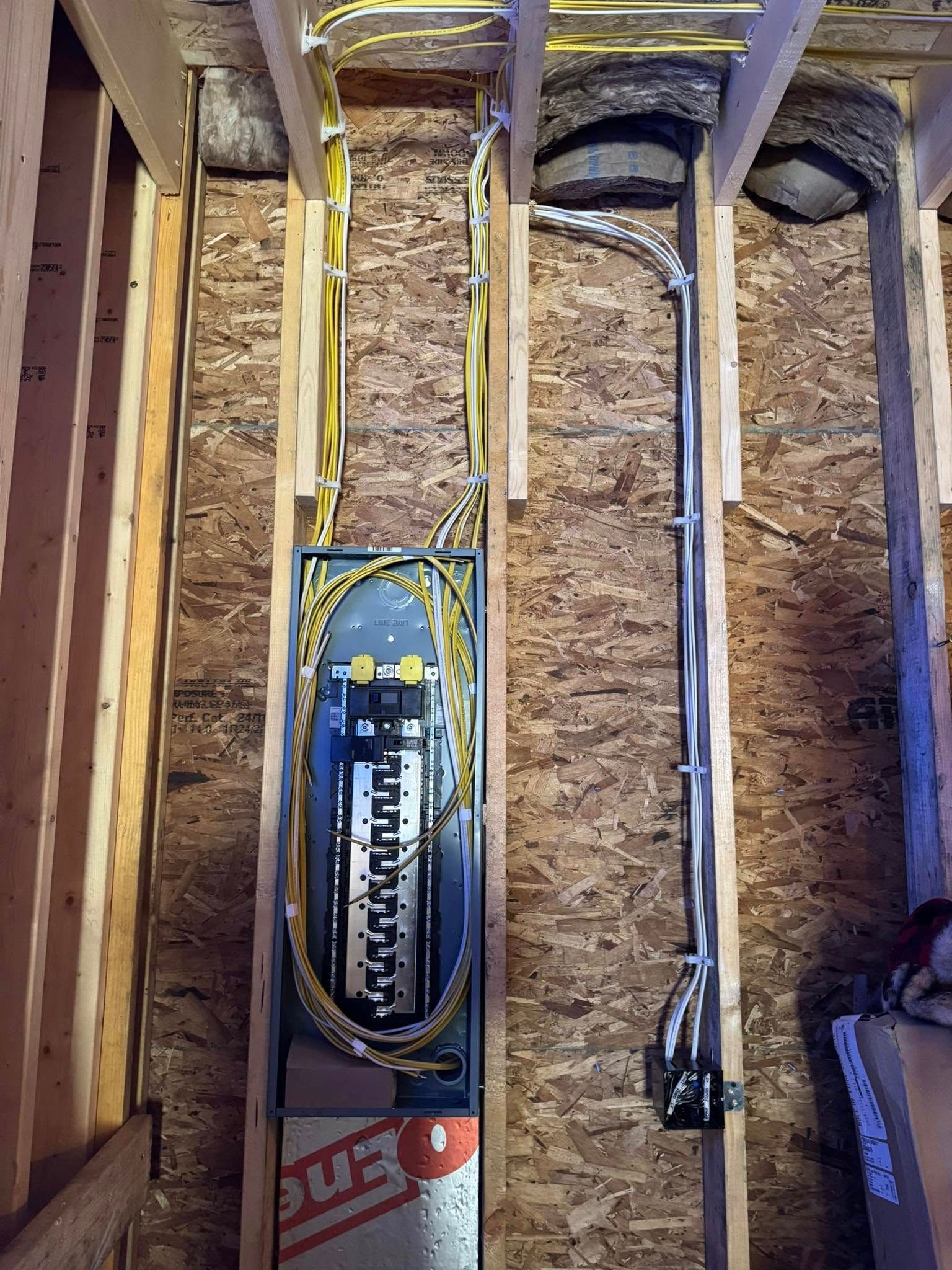 A wooden fence is sitting in the middle of a grassy field.