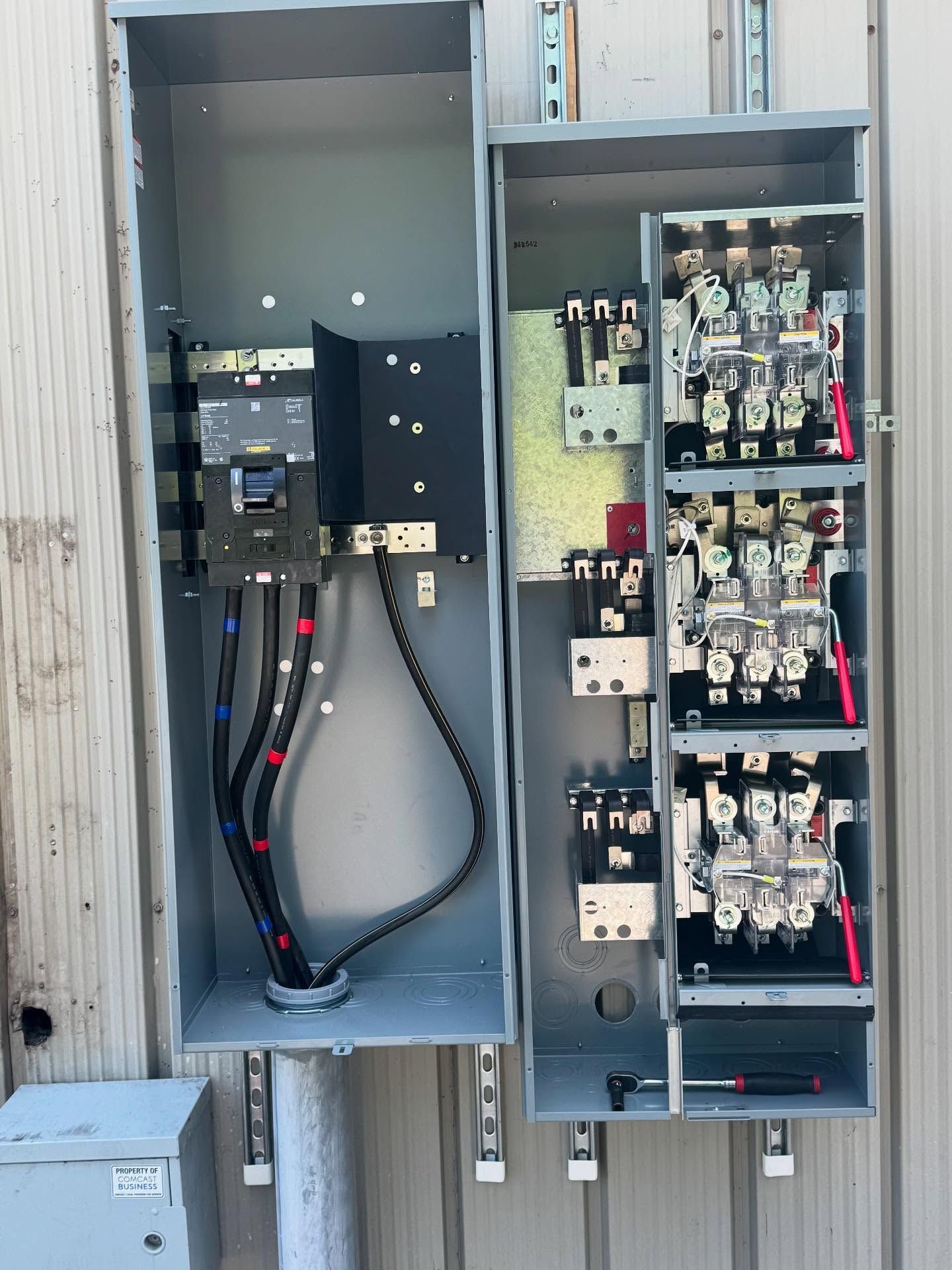 A wooden fence with a gate attached to it.