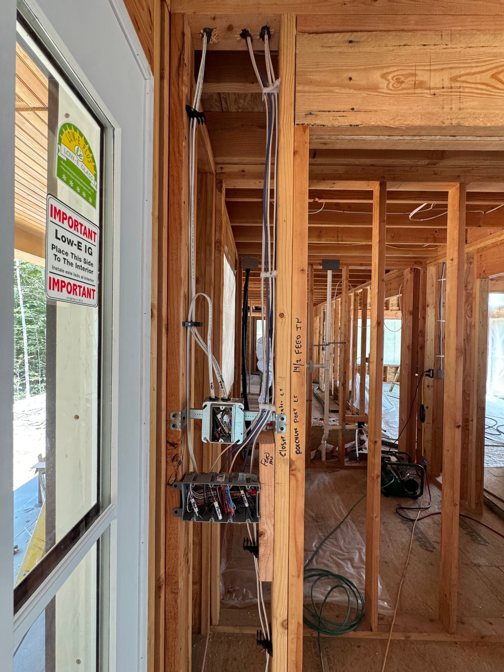 A wooden fence with a gate attached to it.