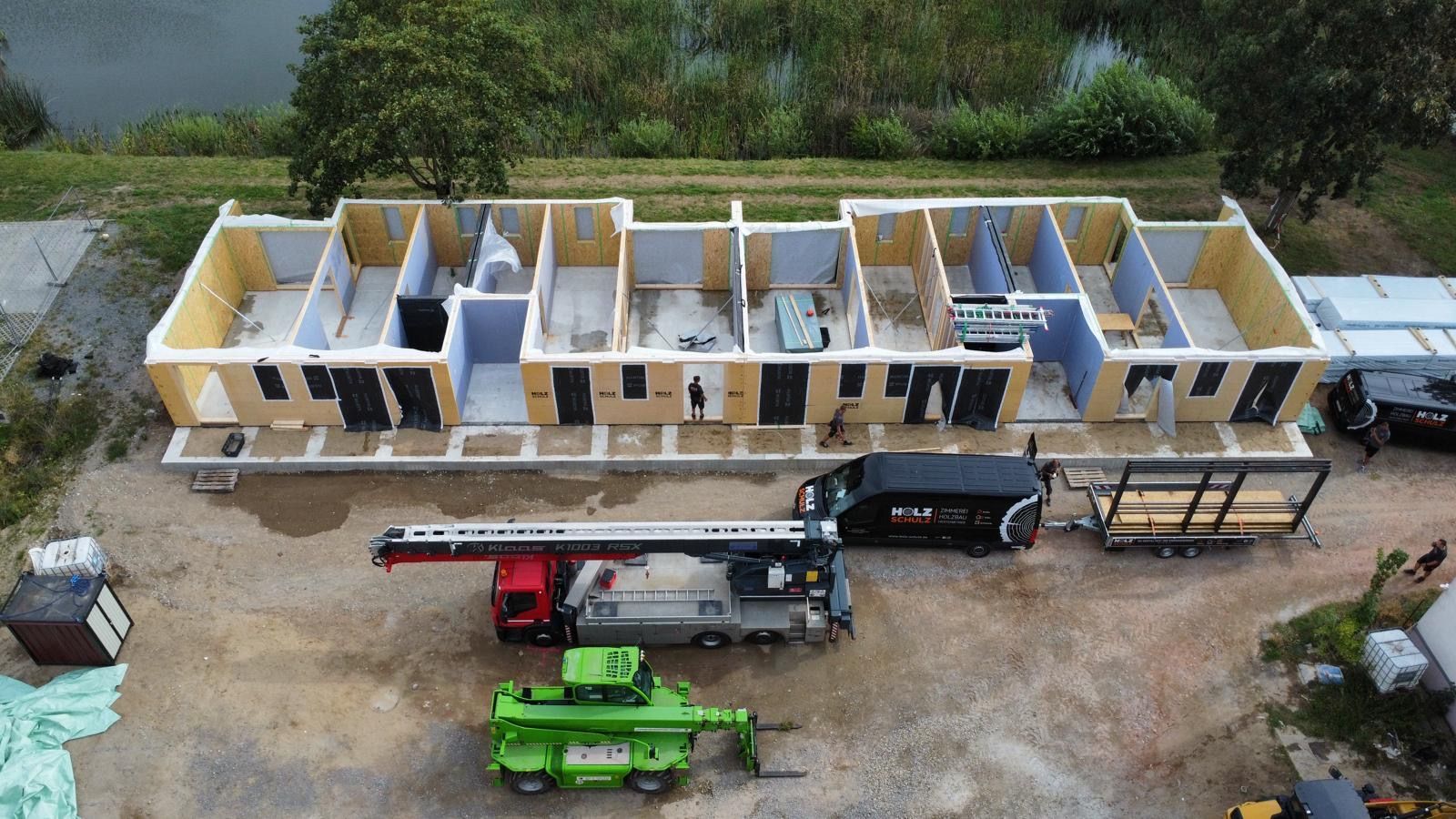 An aerial view of a building under construction.