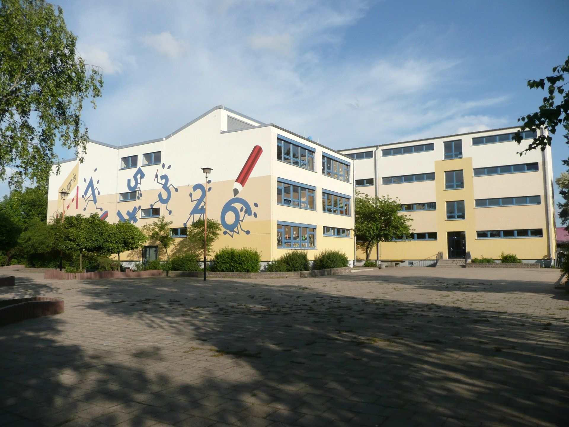 A large building with numbers painted on the side of it