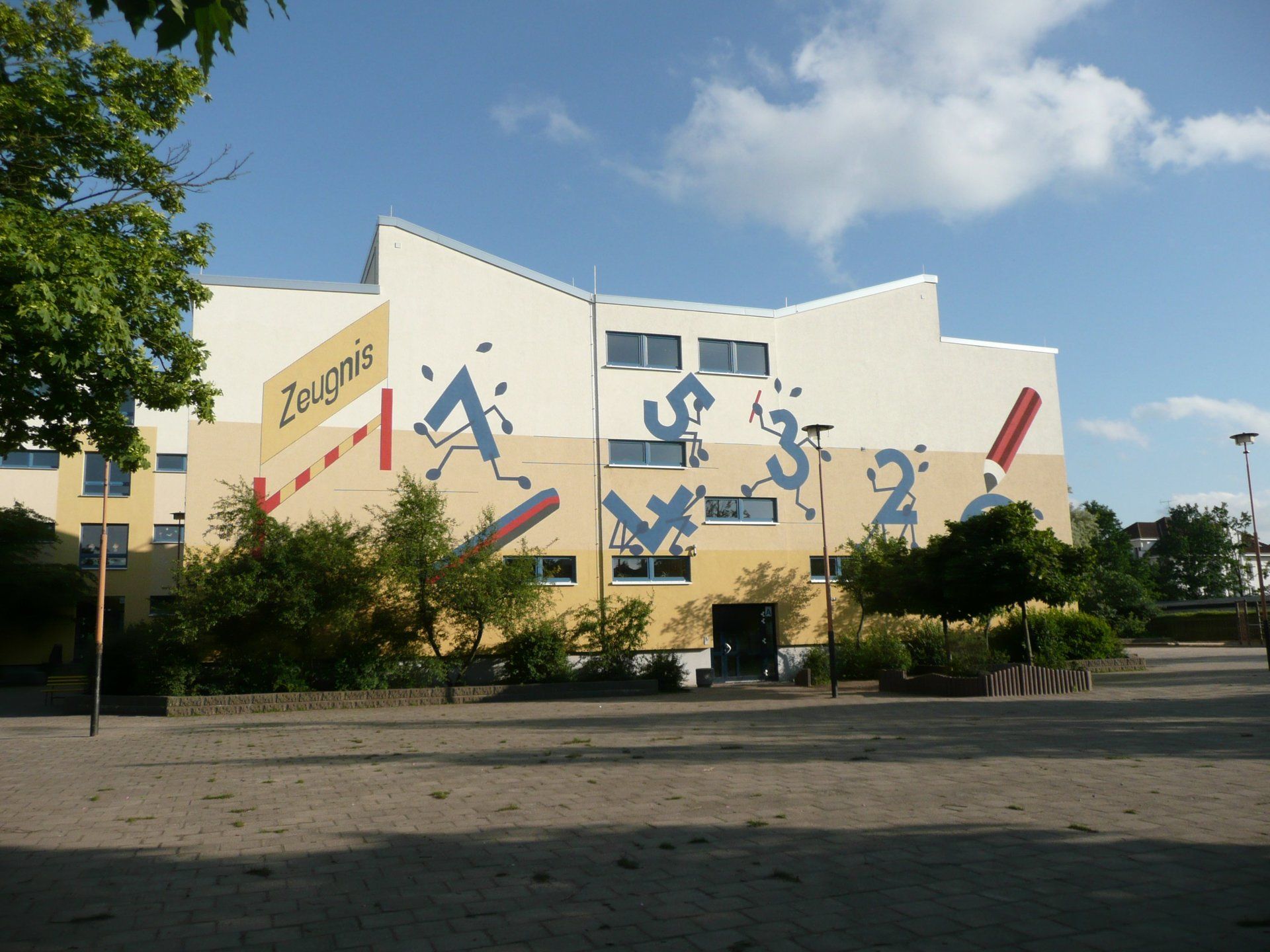 A large building with numbers painted on the side of it