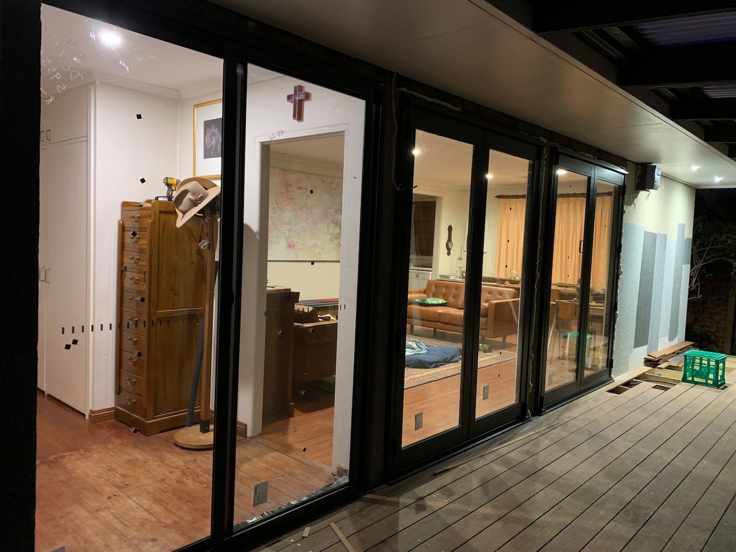 A room with a lot of windows and a cross on the wall. — Renovo Contractors In Monash, ACT