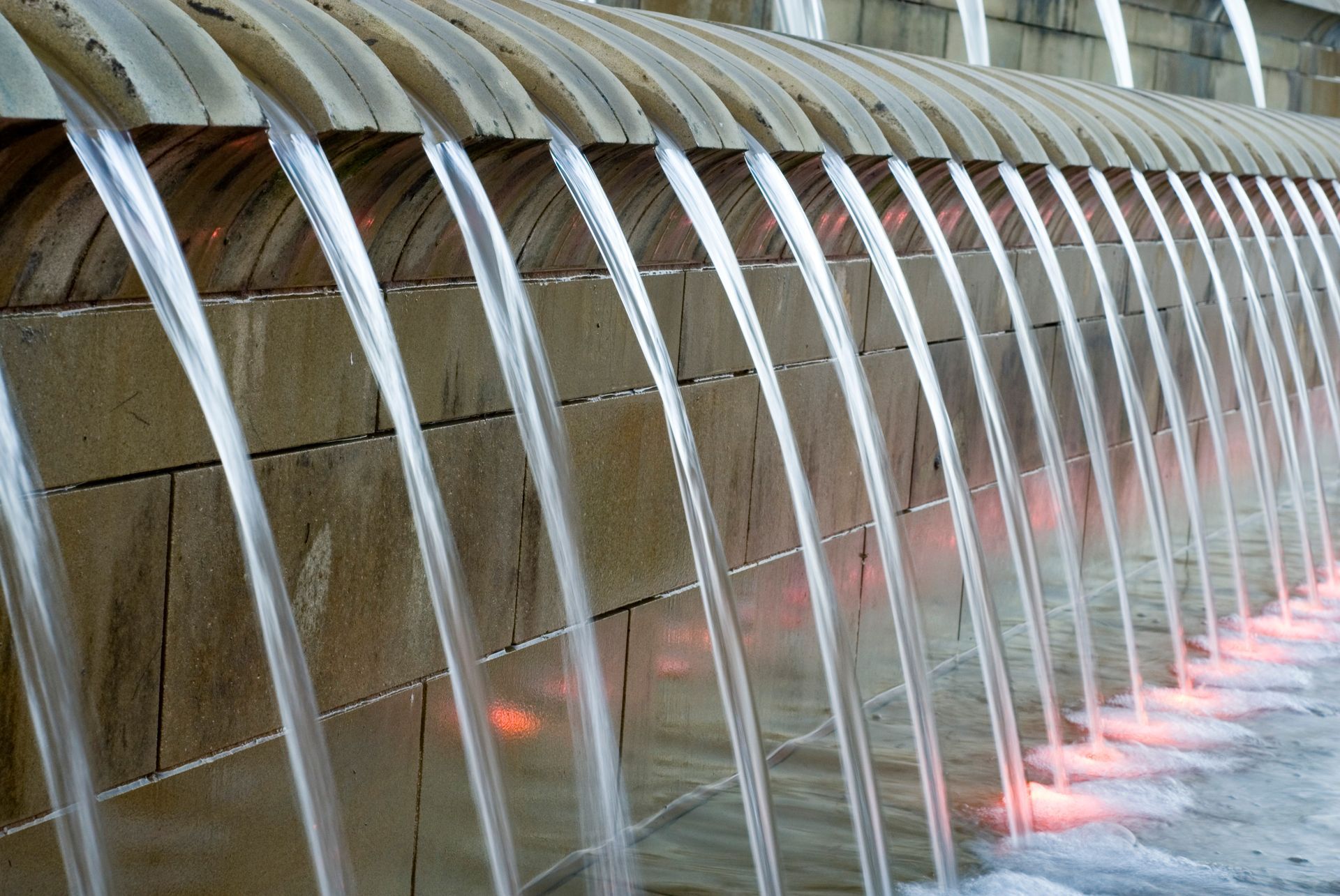 A fountain with a lot of water coming out of it