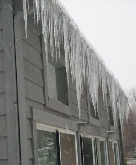 To keep huge icicles and ice dams under control this winter, The Gutter Cover Company can install the Heater Cap system to keep your gutters from looking like this.