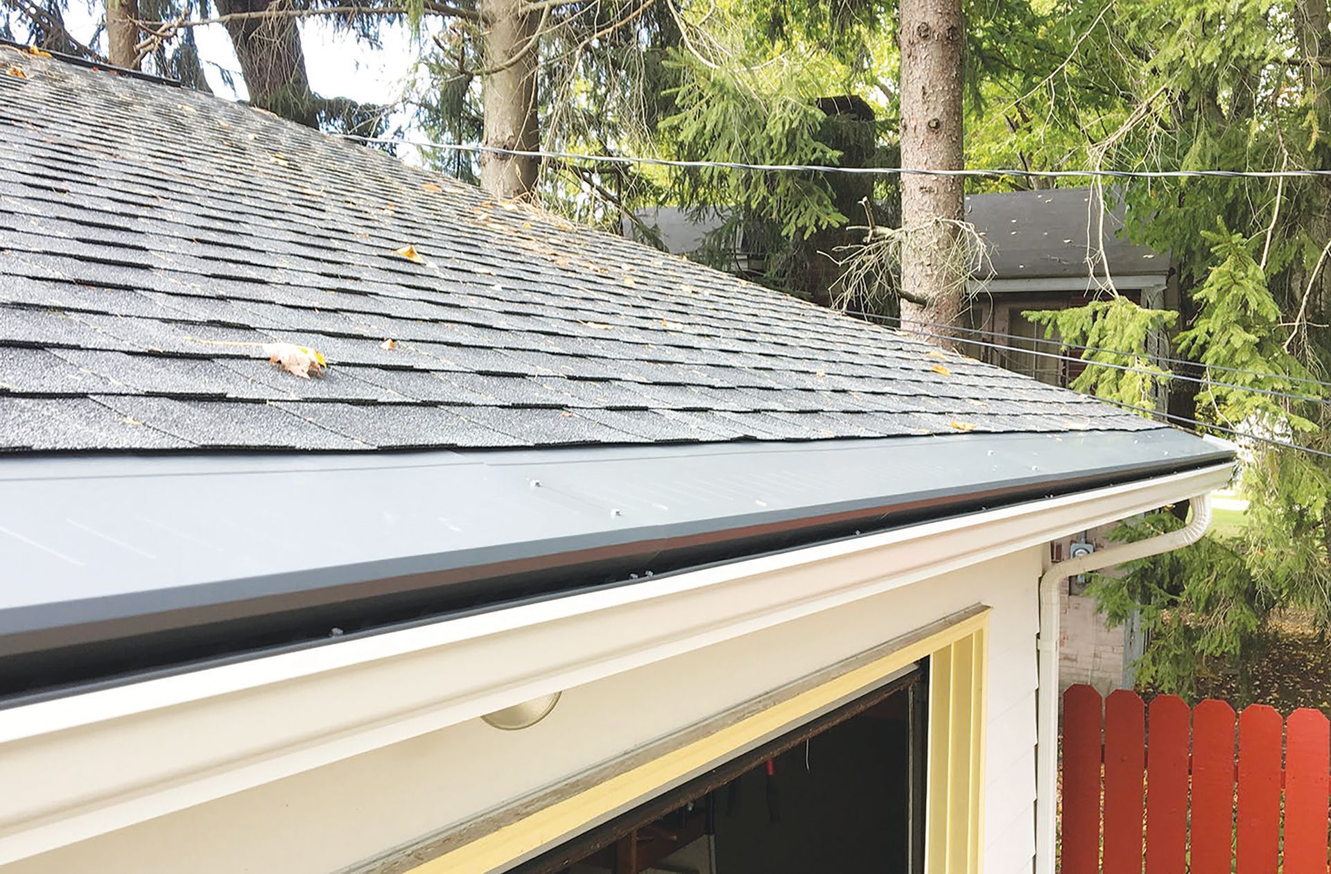 The smooth, solid, strong Gutter Topper from The Gutter Cover Company