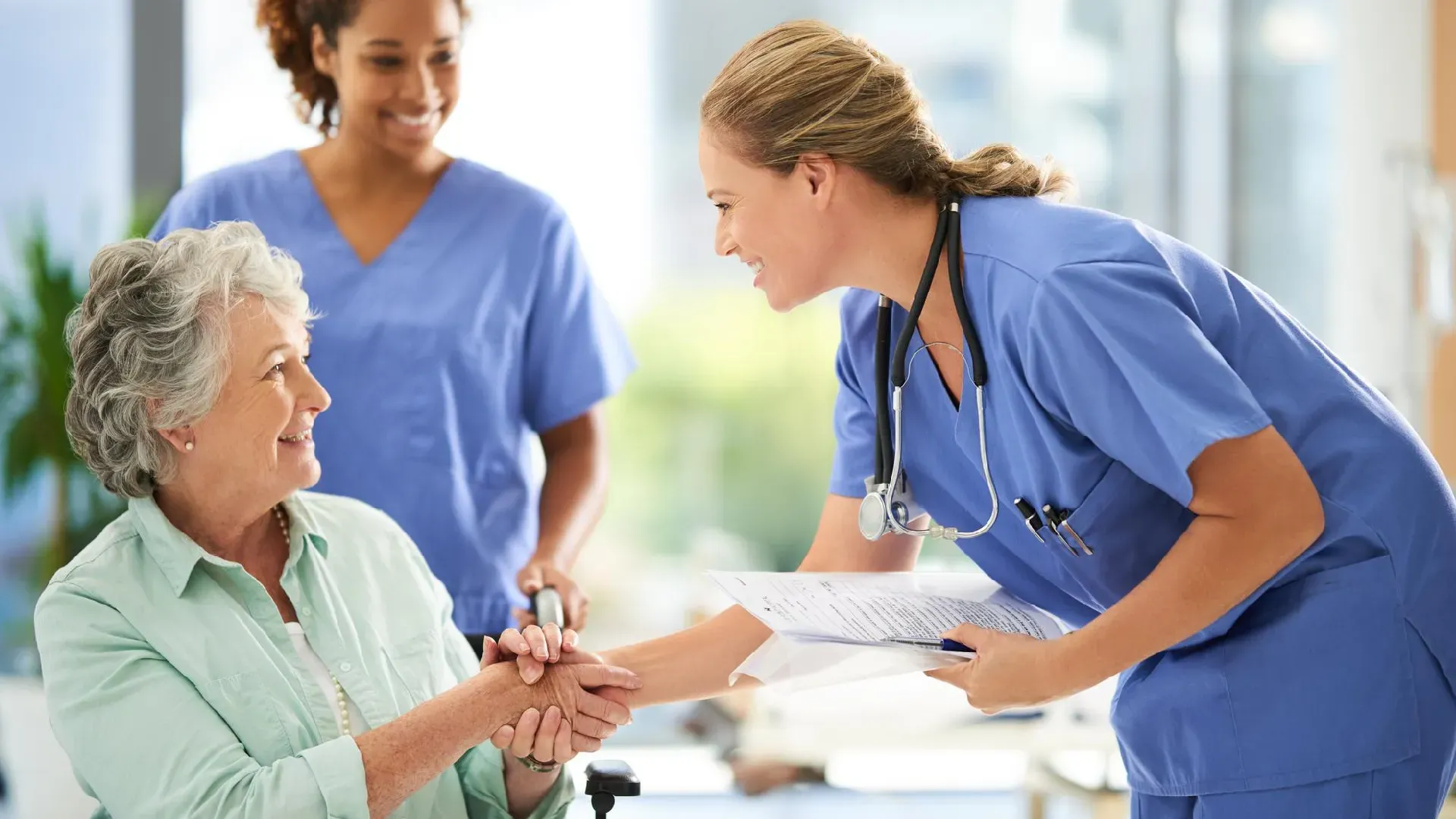 aged care nurse with senior woman