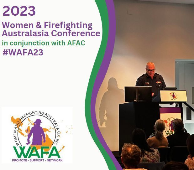 2023 Women & Firefighting Australasia Conference, man at podium. Conference attendees in audience.