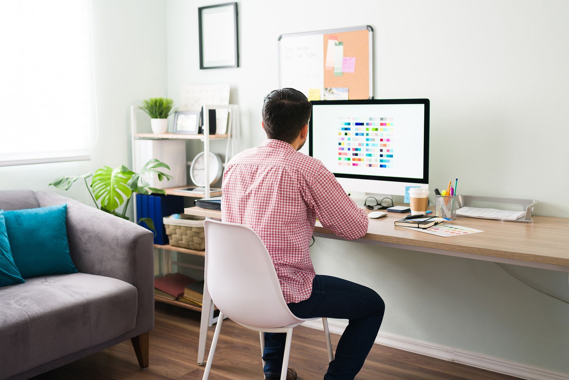 Men working at desk at home