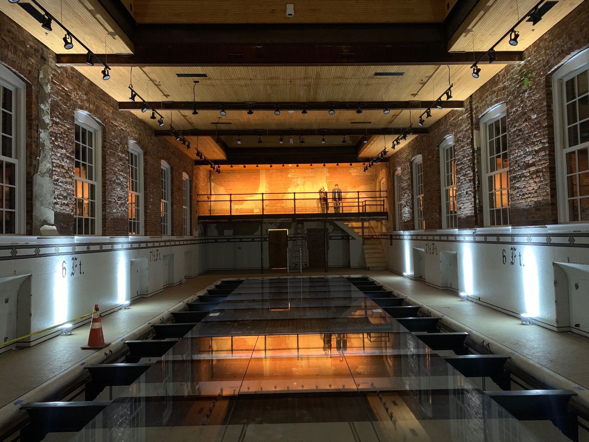 701 Whaley renovation. Glass floor over a historic pool. (Columbia, South Carolina)