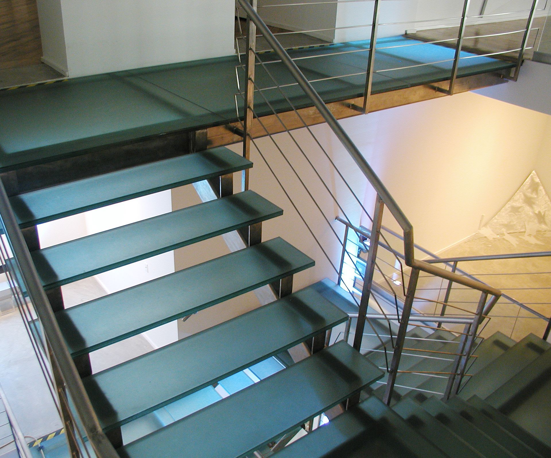 light blue glass staircase