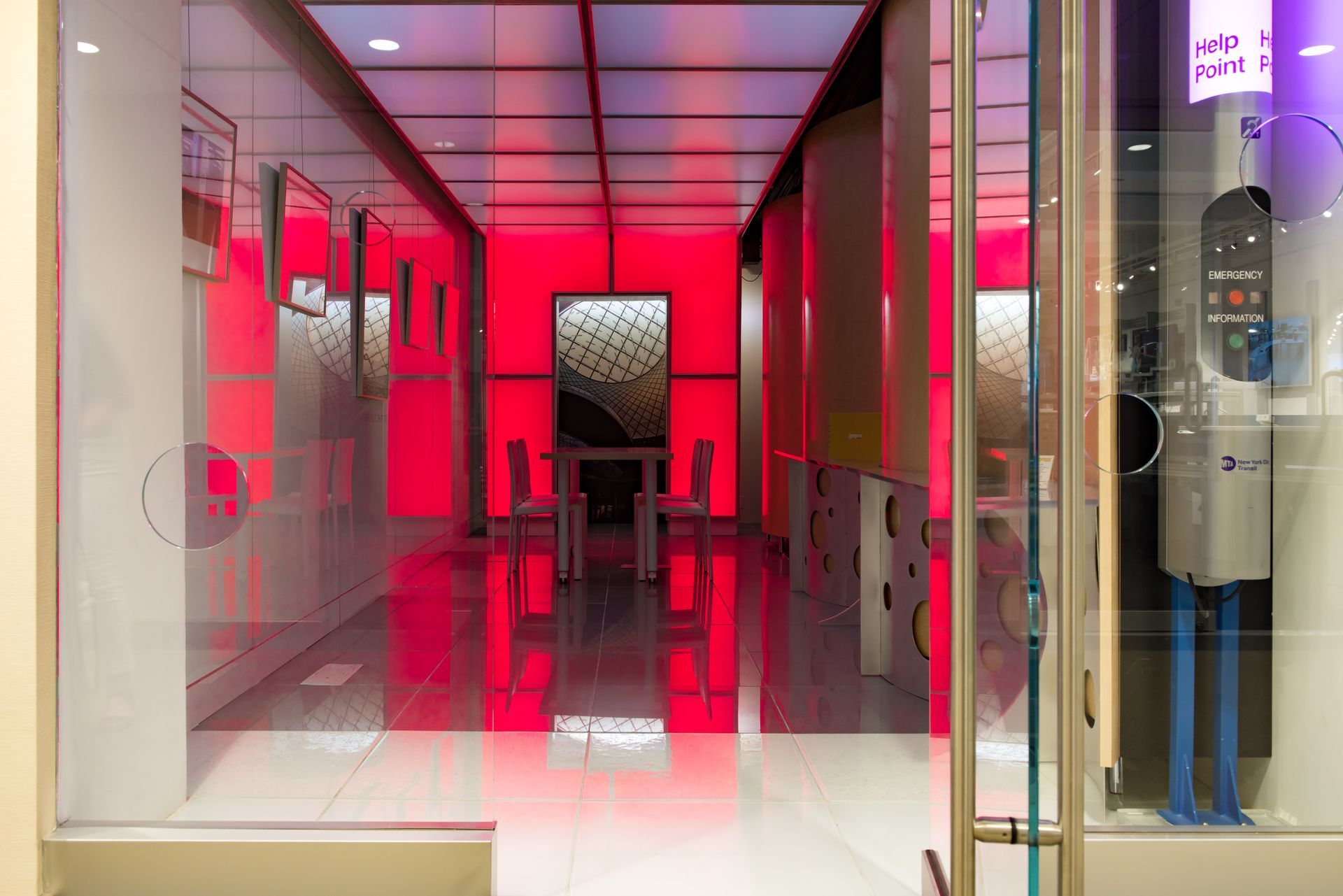 Custom glass flooring with red backlit LED lights.