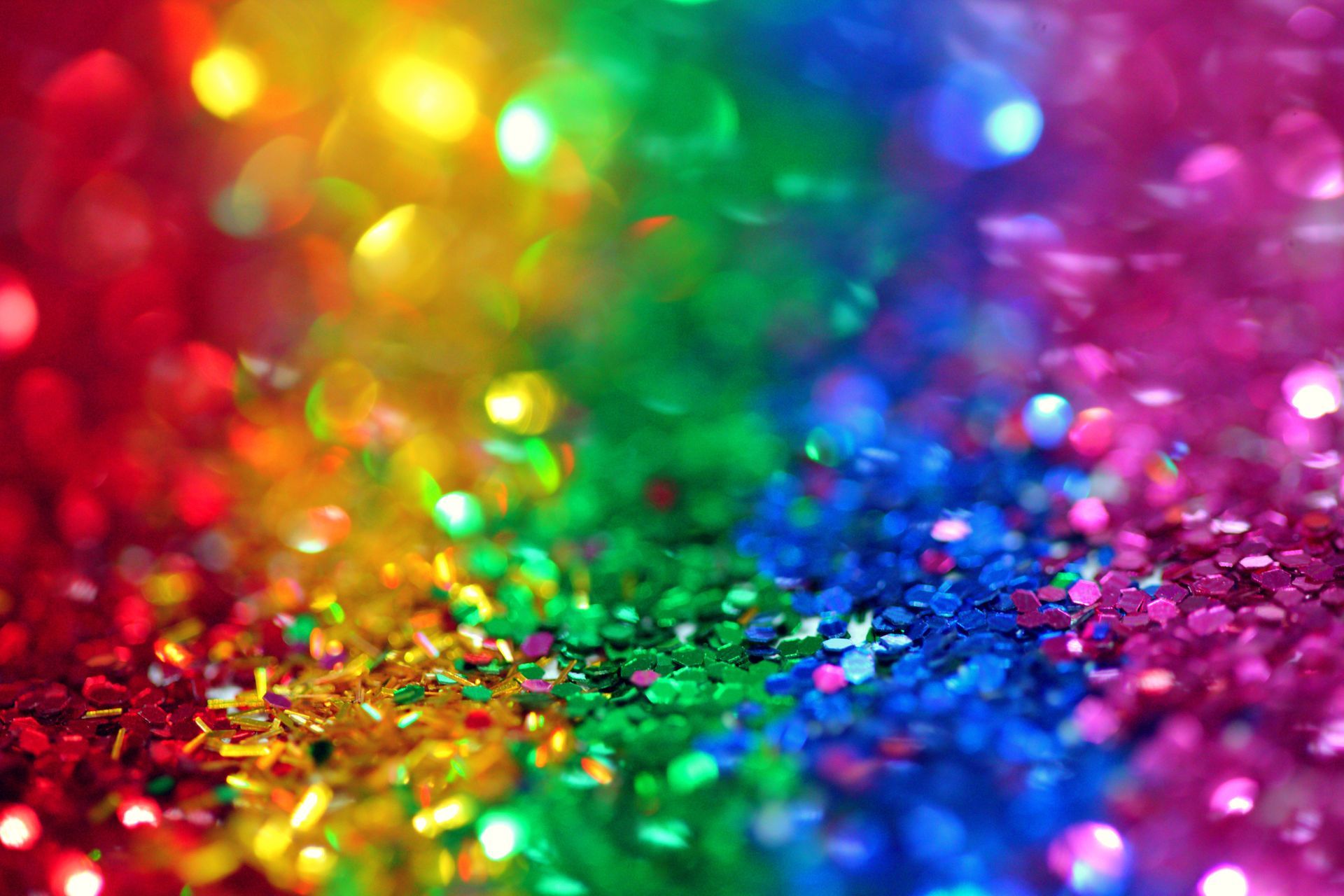A rainbow of colored glitter confetti.