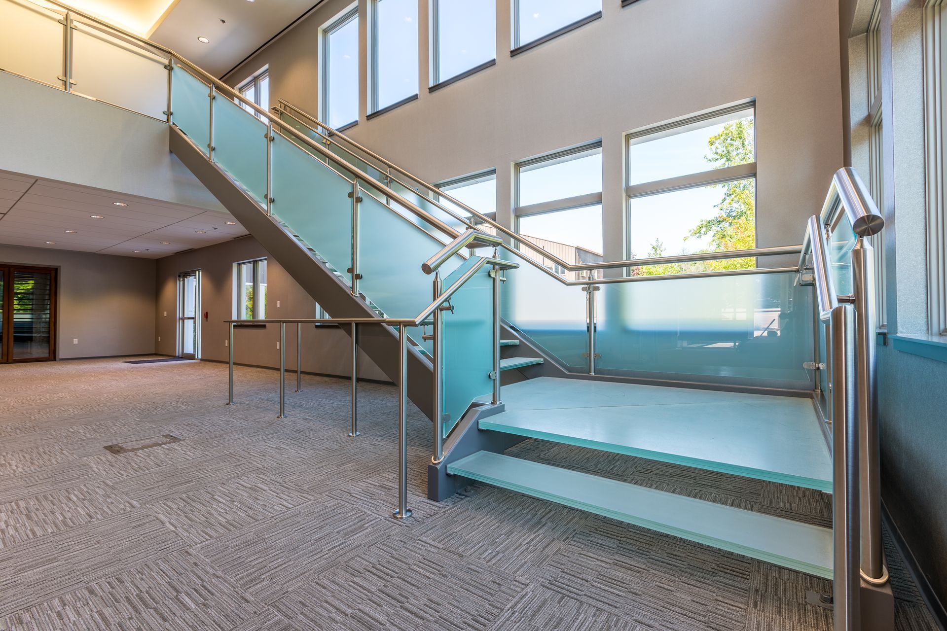 glass staircase at corporate office