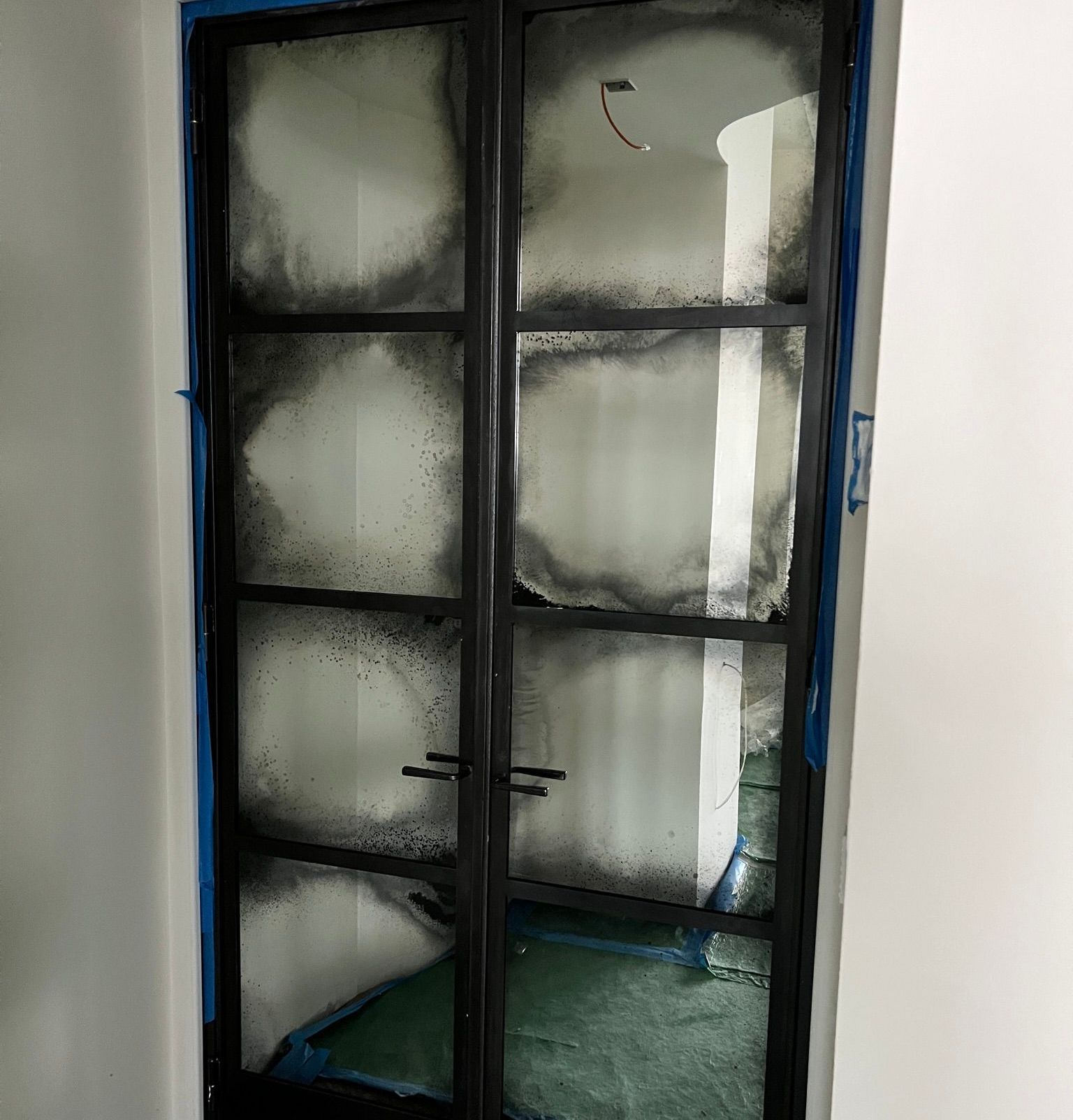 A door that has a lot of windows on it