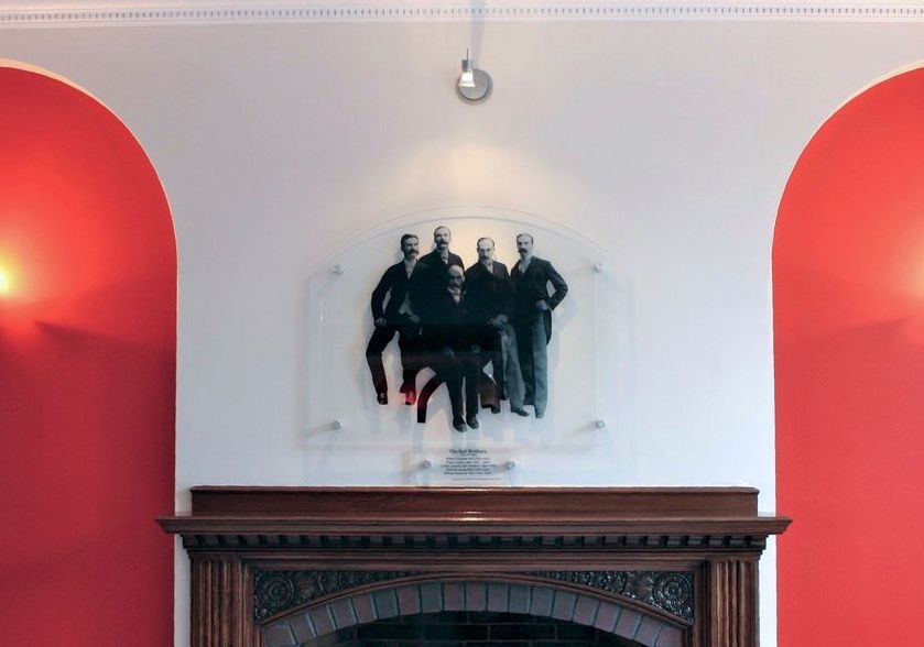 photographic art glass above fireplace