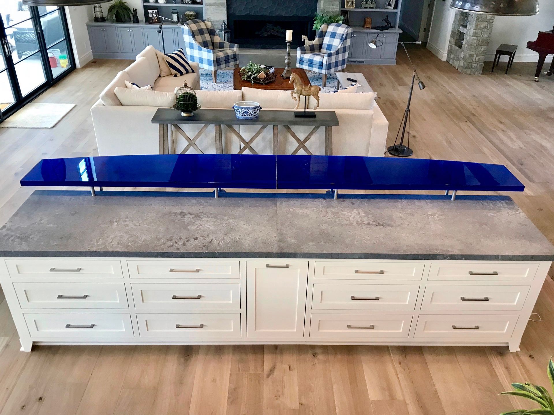 A raised blue glass countertop.