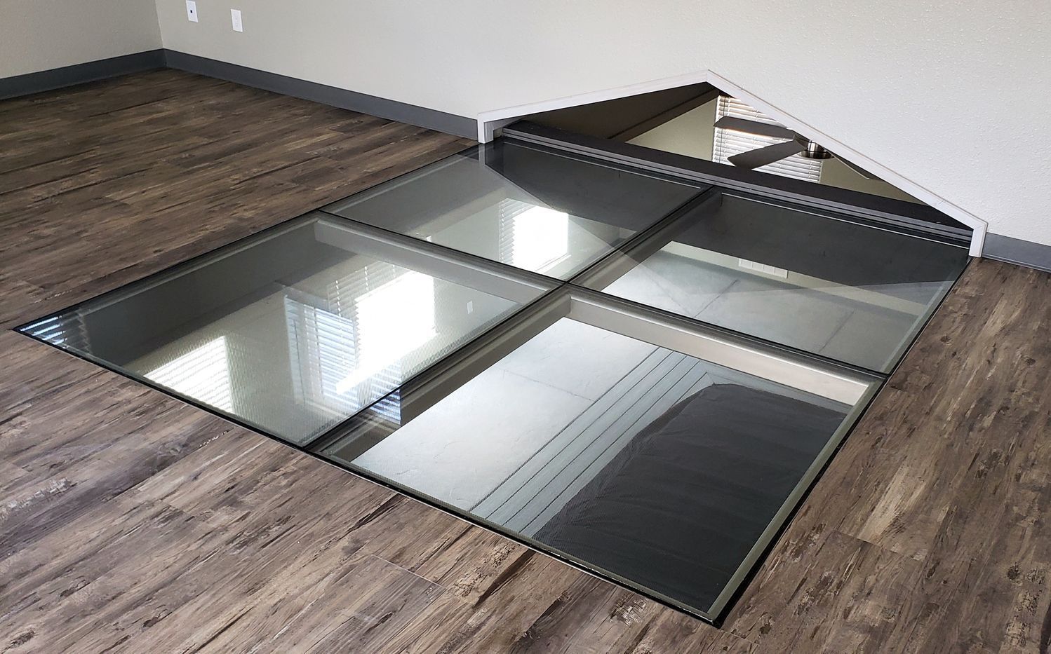 Modern interior glass flooring in a private residence.