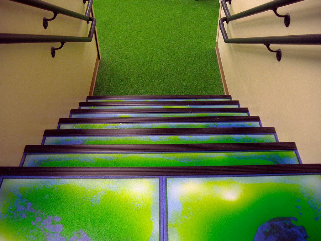 A set of stairs with a picture of the earth on them