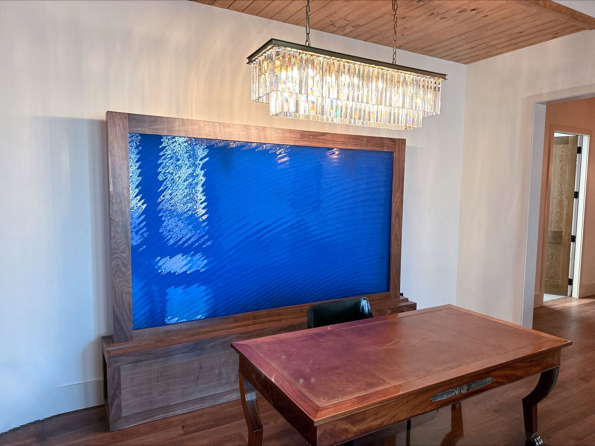 blue glass wall dining room