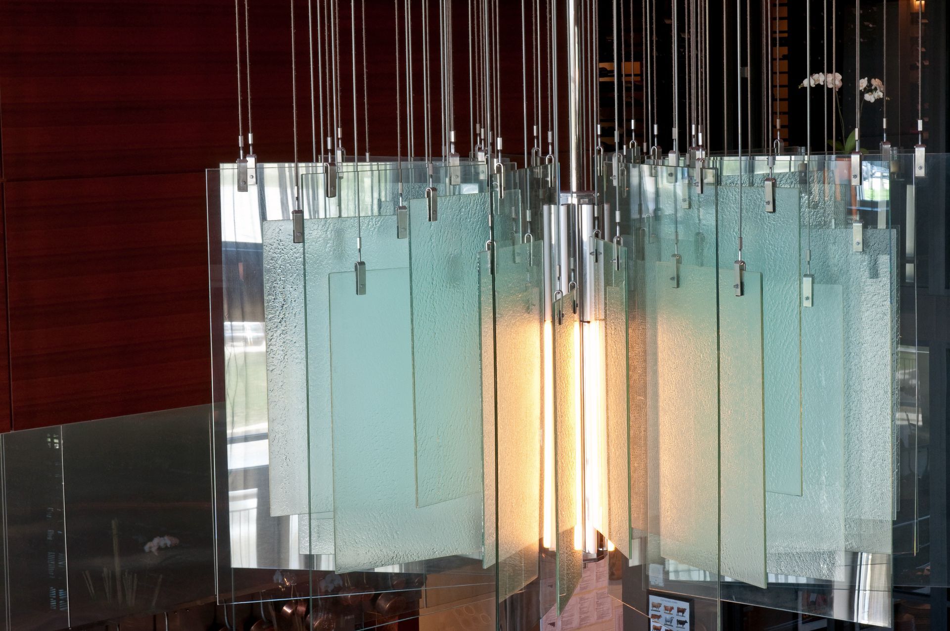 Decorative glass chandelier with frosted and clear rectangular panels.