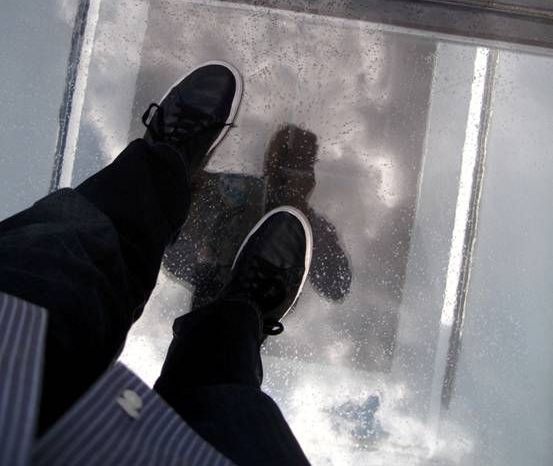 someone walking on walkable glass skylights