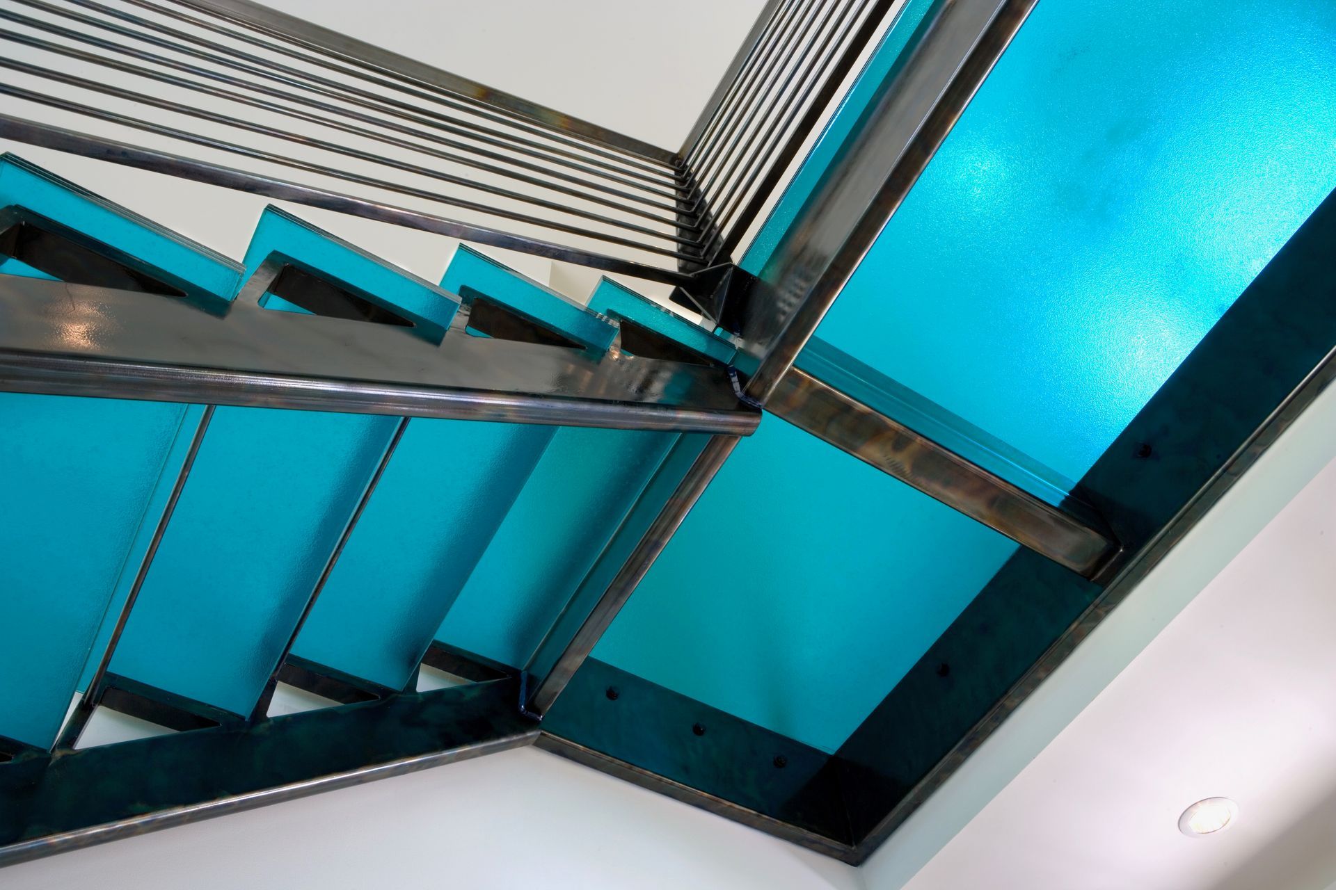 bright blue glass stair case