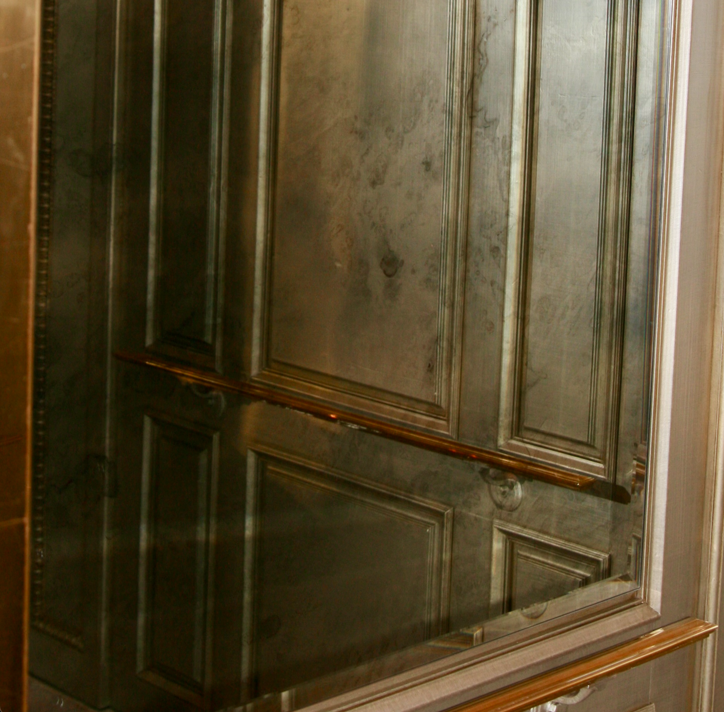 A door with an antique mirror