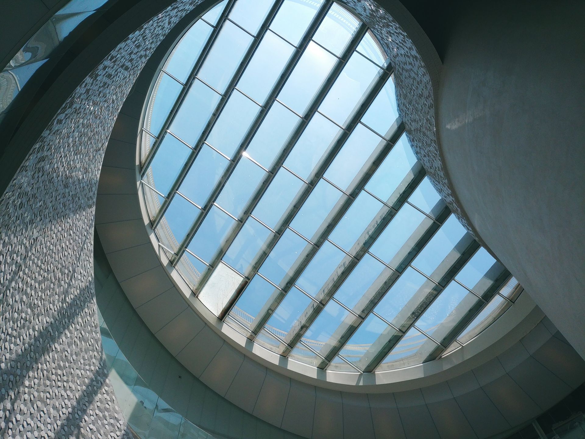 A series of skylights photographed from below.