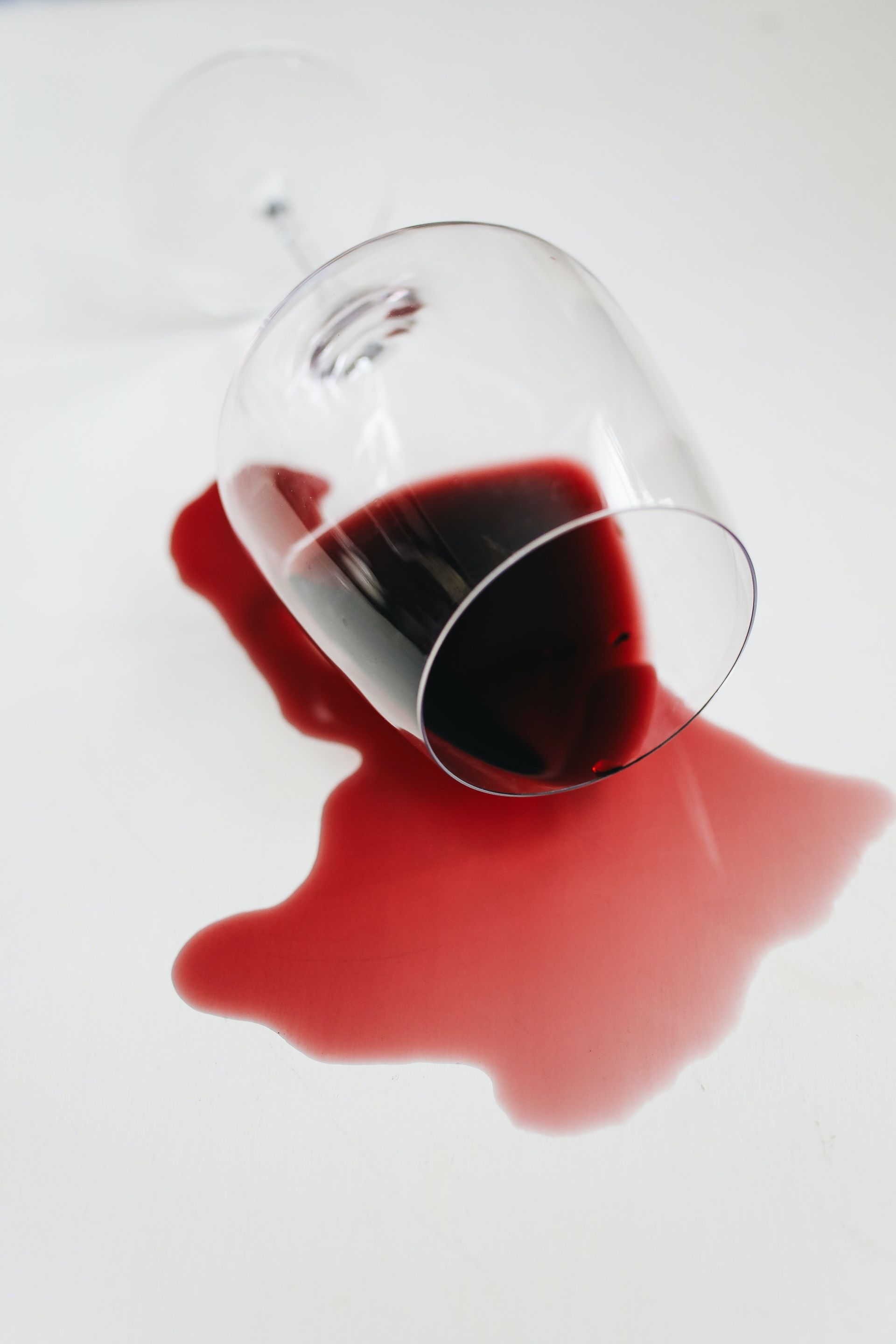 A glass of spilled wine.
