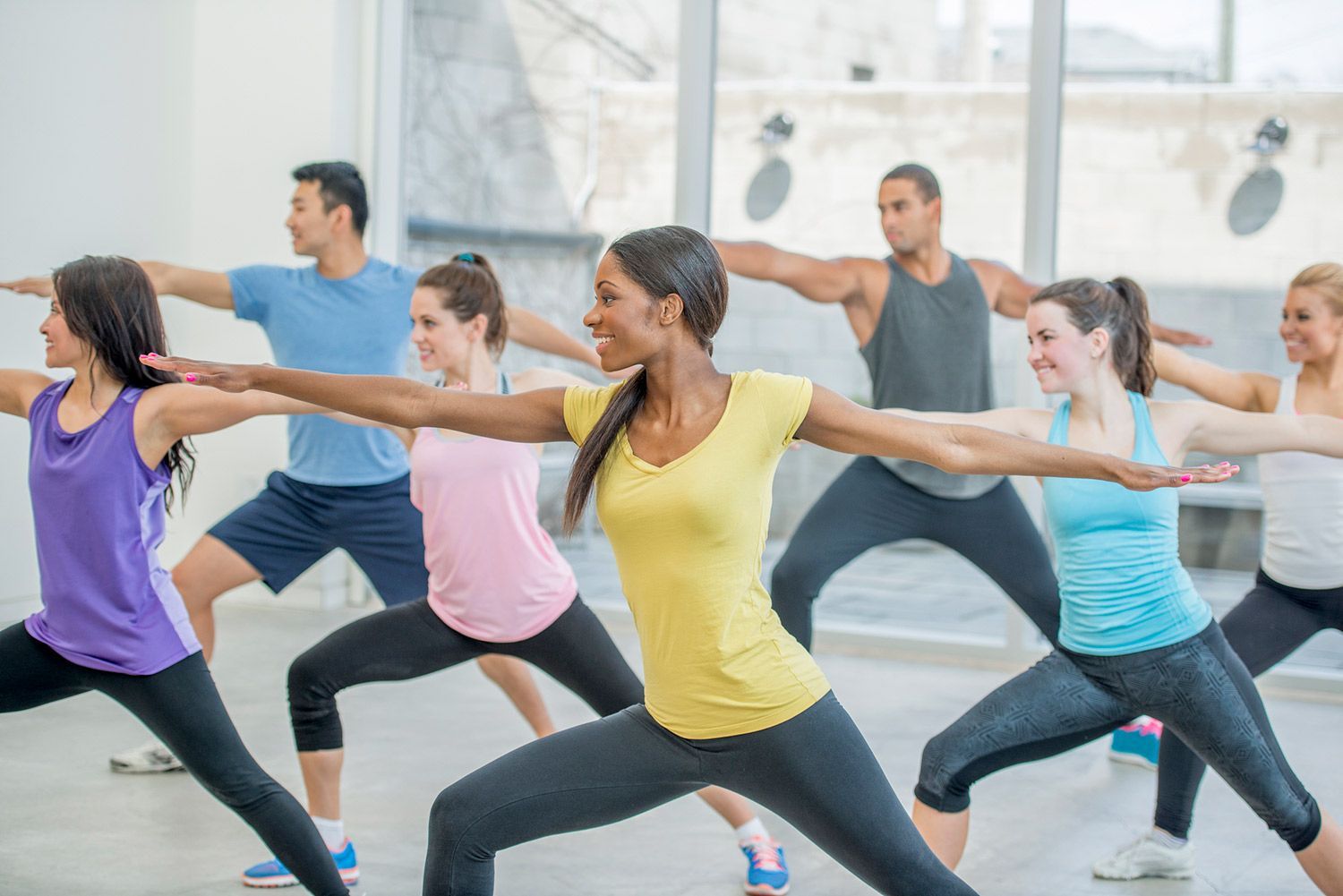 Group of Happy People in a Yoga Class