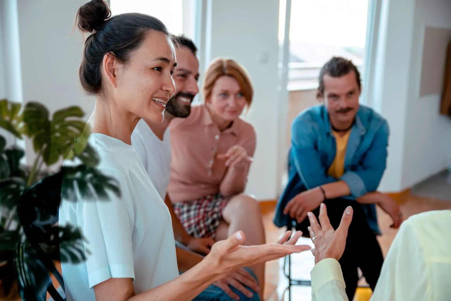 A group of people is talking to each other.