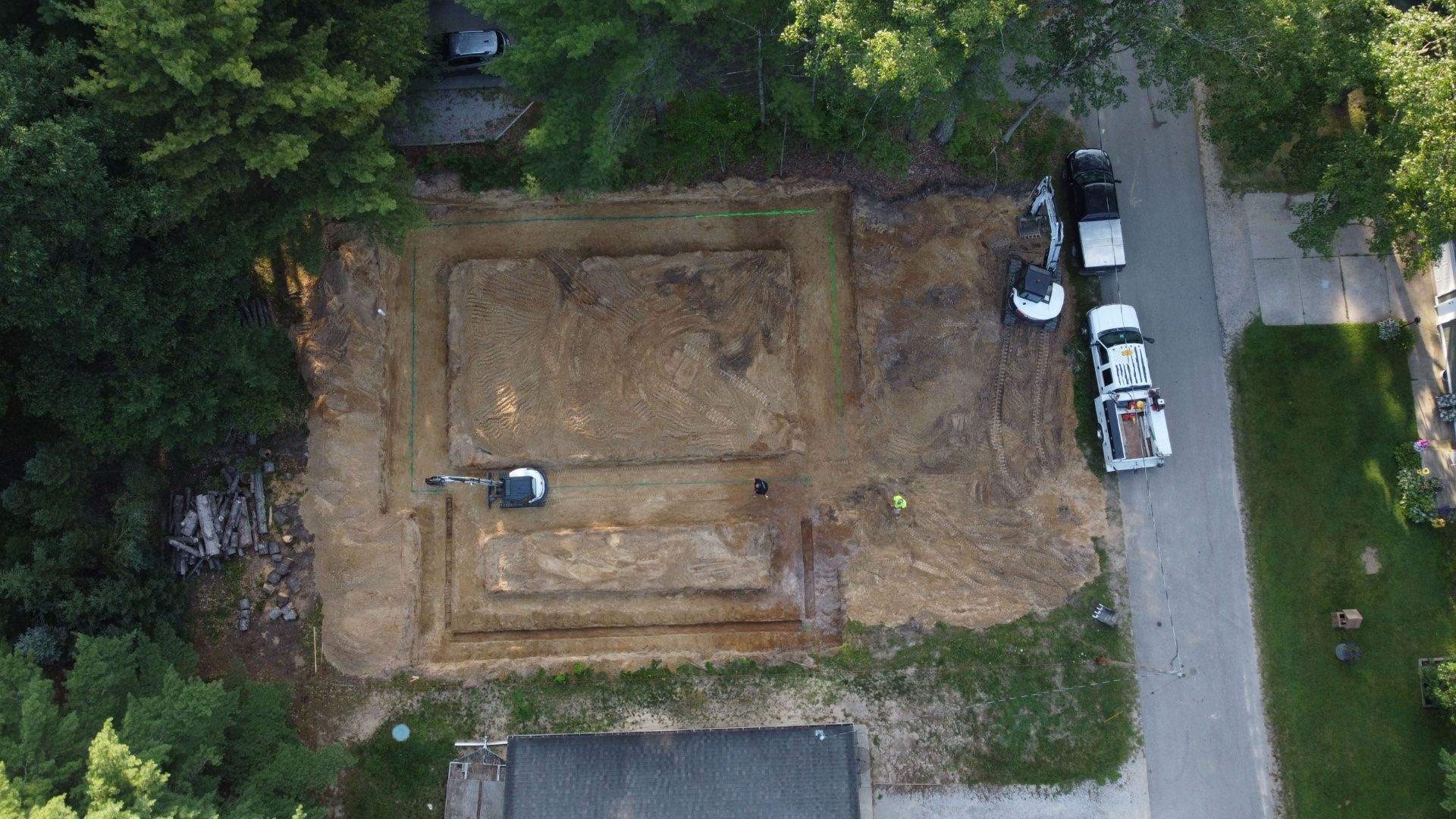 Big excavator moving earth in the construction works of a road