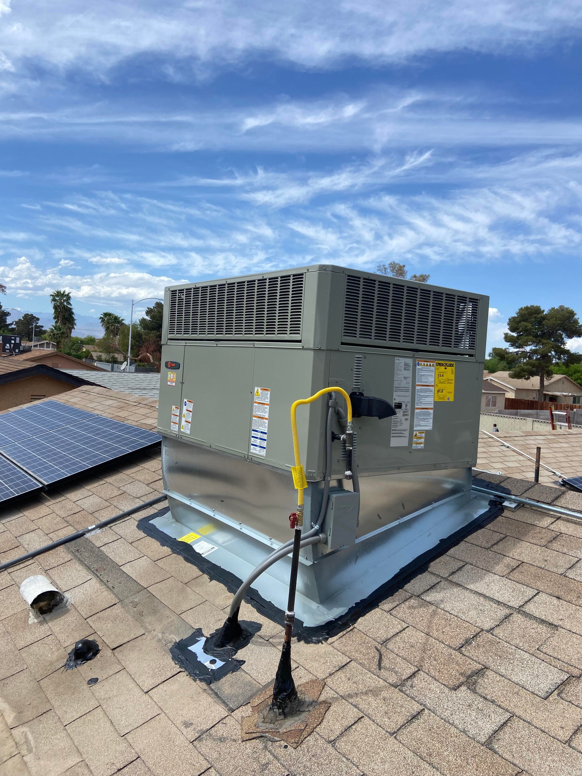A close up of a heater with a lot of wires coming out of it.