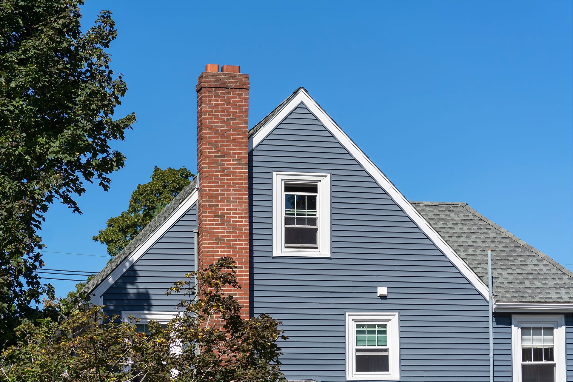 Residential House With Brick Chimney