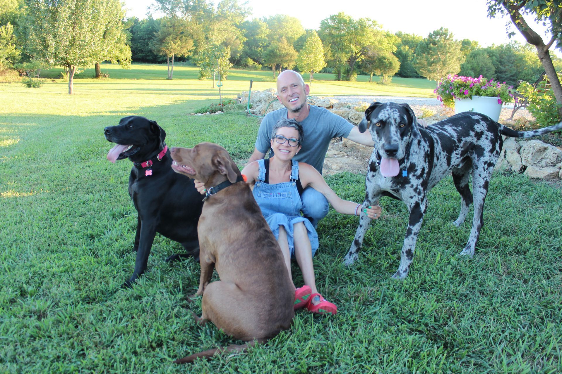 Wheat State Insurance Group Agent Jessica Smith with husband Ryan and their 3 dogs
