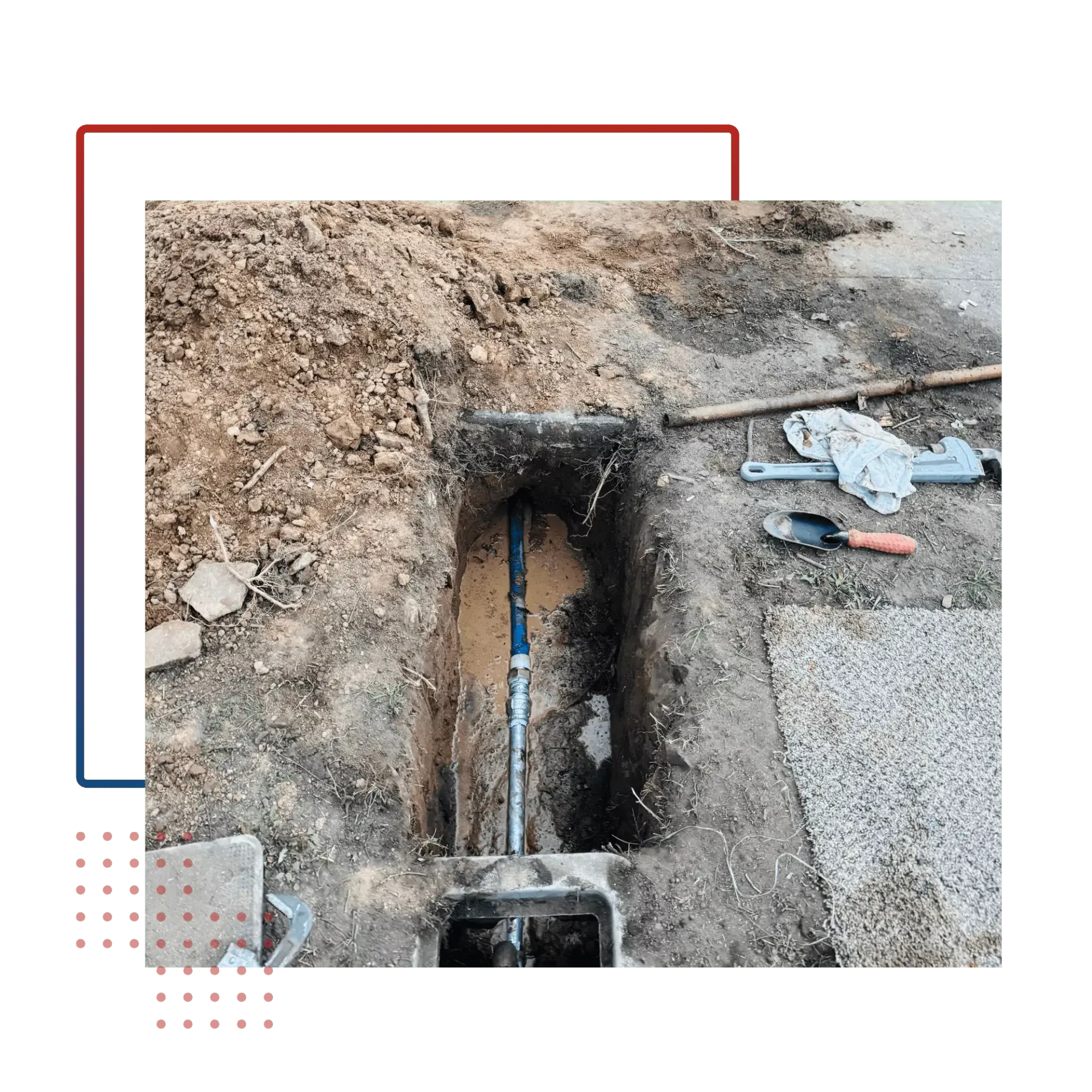 A pipe is being installed in a hole in the ground.