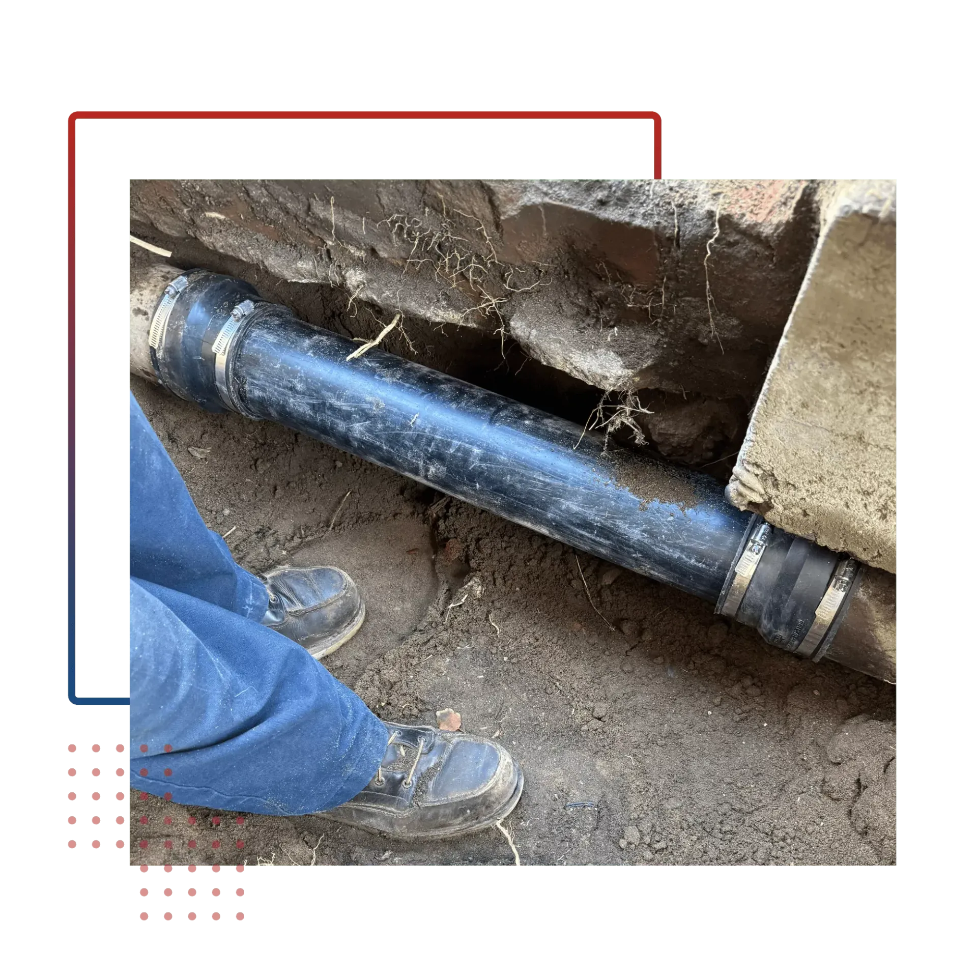A person is standing next to a pipe in the dirt.