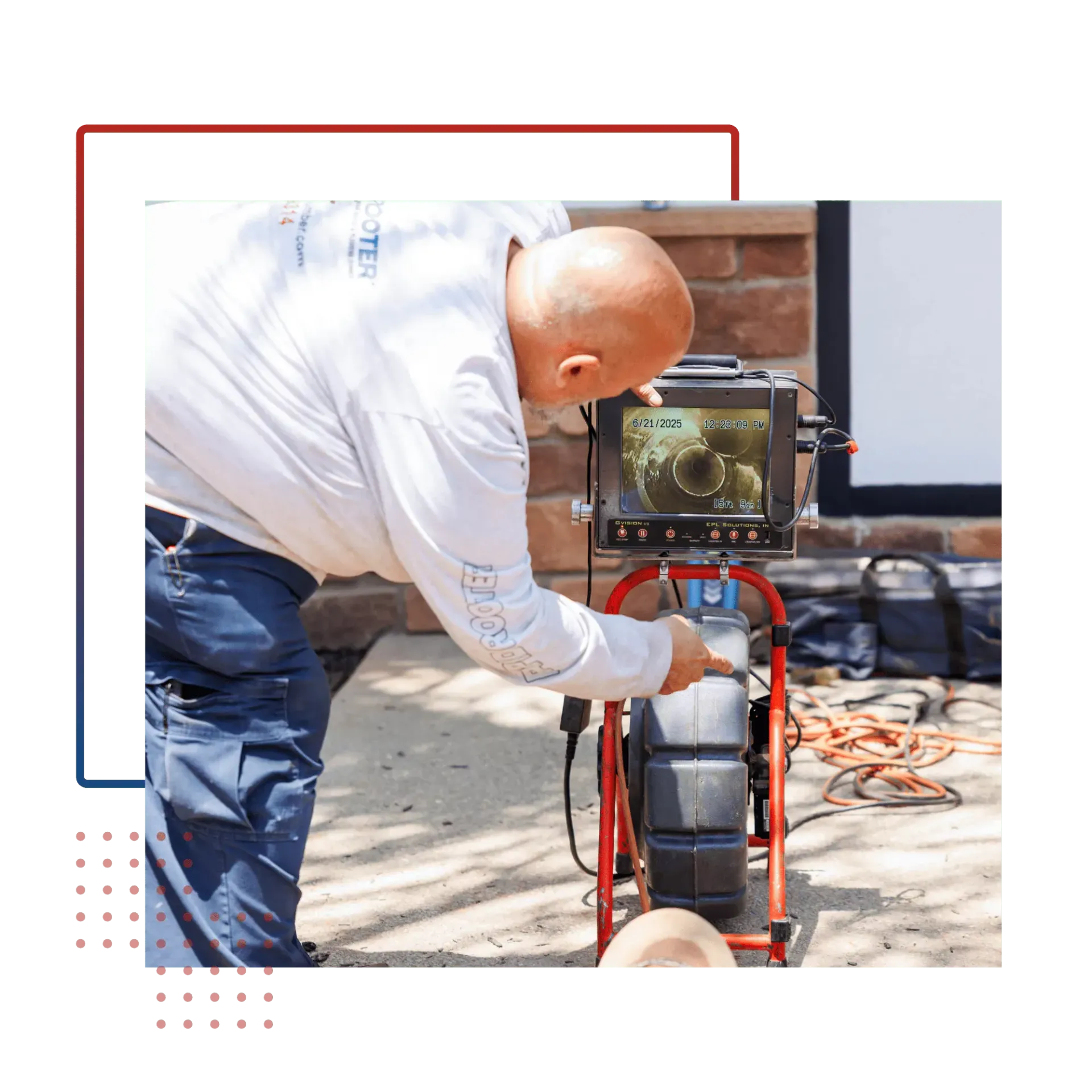 A man is fixing a drain with a camera.