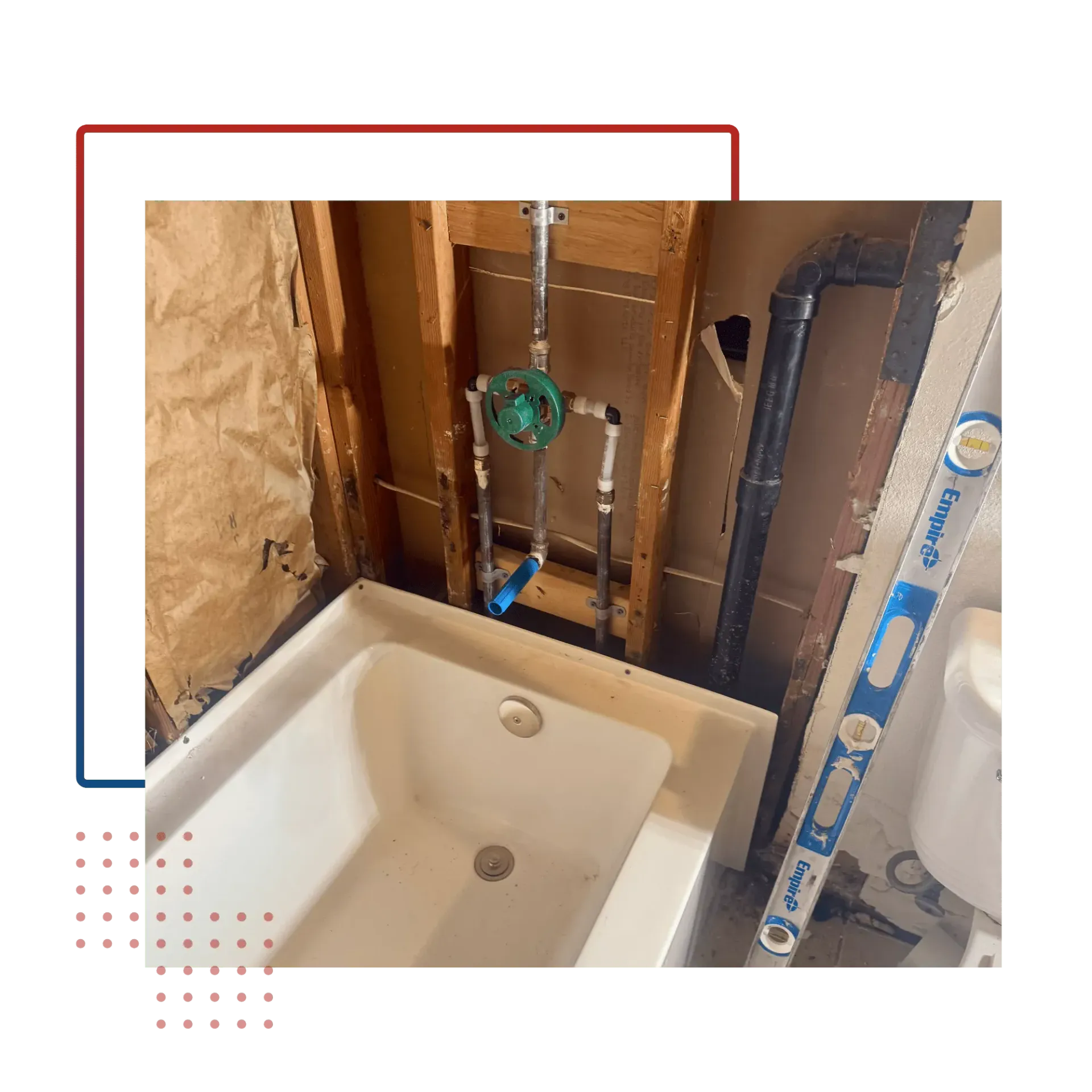 A bathtub is being remodeled in a bathroom with a level.