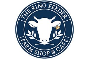 The logo for the ring feeder farm shop and cafe shows a cow with a tag on its neck.