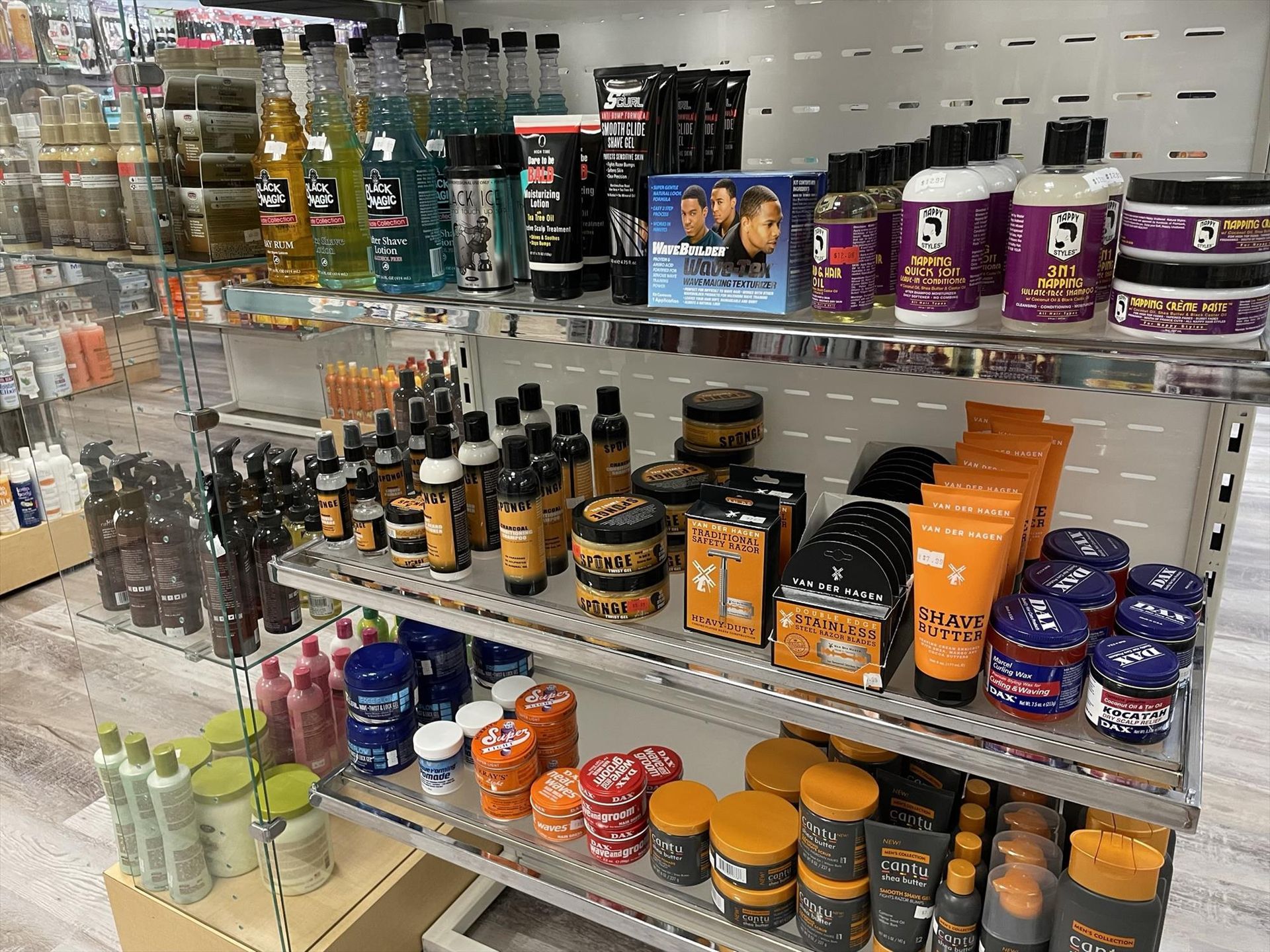 Shelves filled with various hair care products in a retail store.