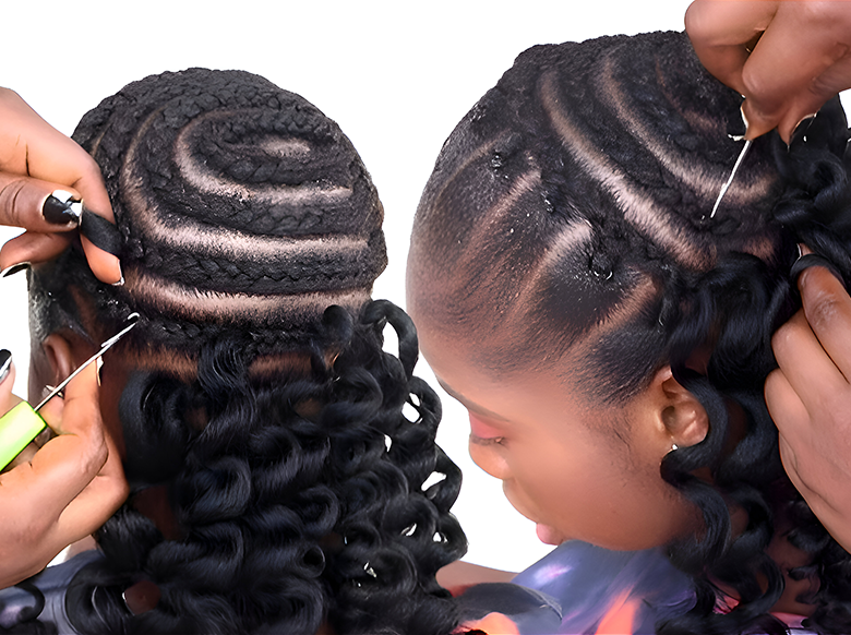 Two women having crochet braids installed in a salon. Braids are being looped onto cornrows.