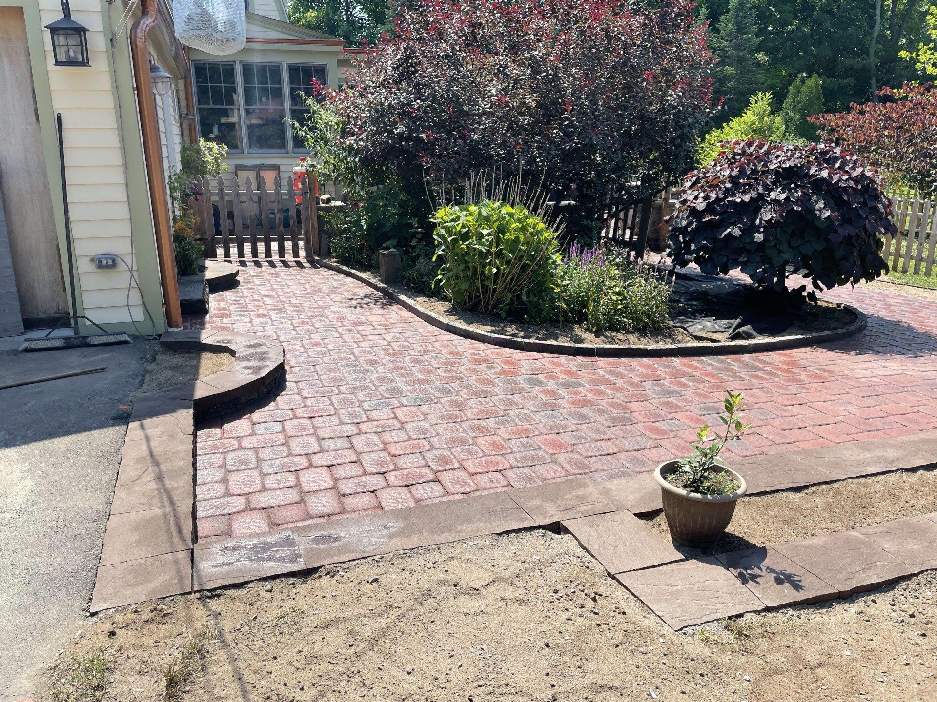Stone Patio with walkways and garden beds in South Windsor CT